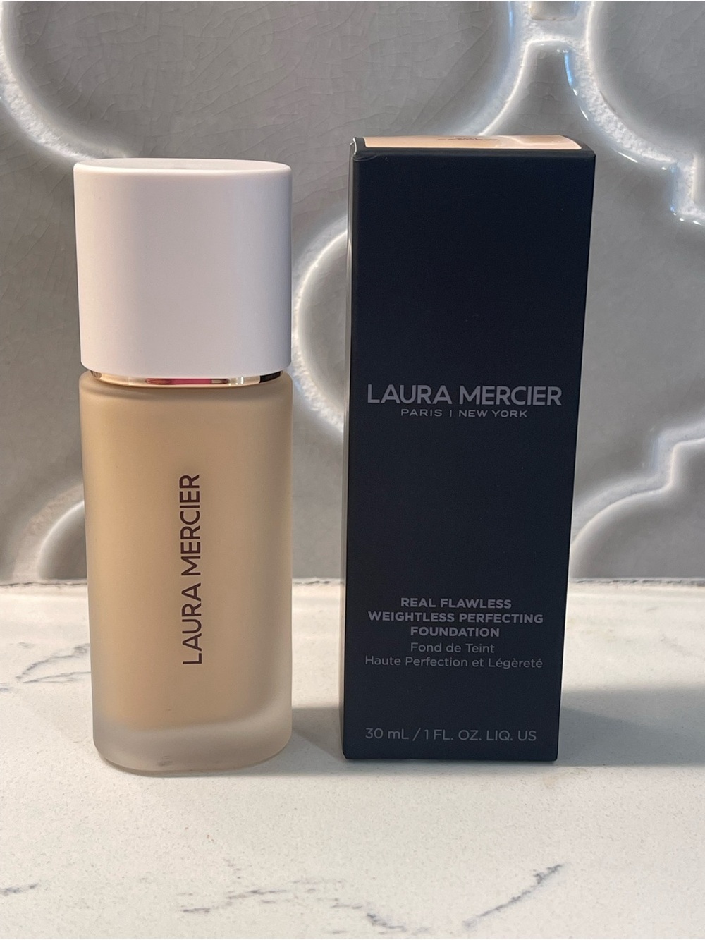 laura mercier Foundation Bottle in Warm Beige and White